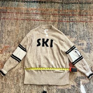 Lou & Grey Ski Mock Neck Sweater in a Tan Heather Cotton Blend.